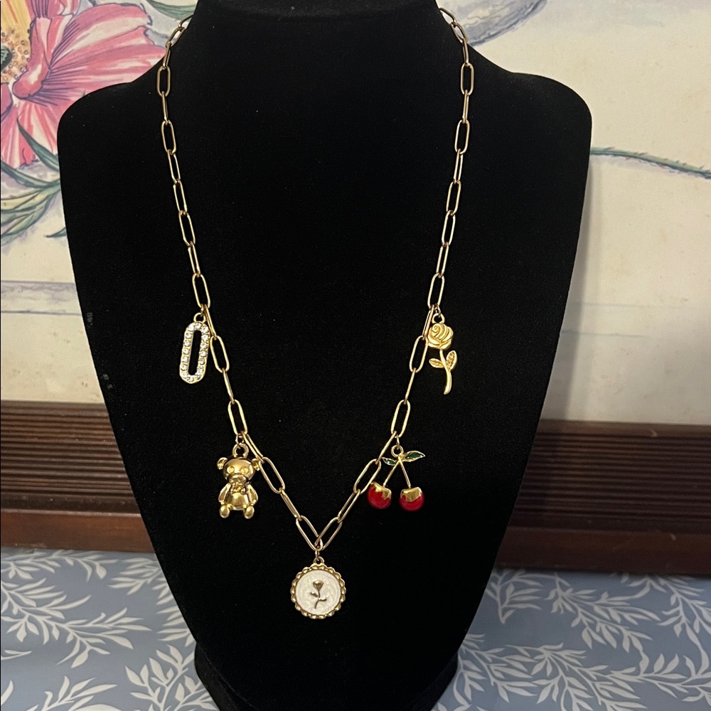 Gold plated stainless steel multi charm necklace